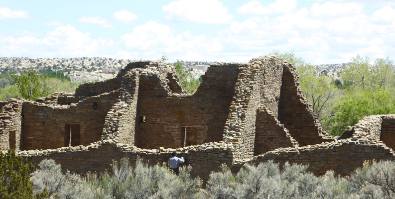 Ranger working on wall Aztec Ruins NM