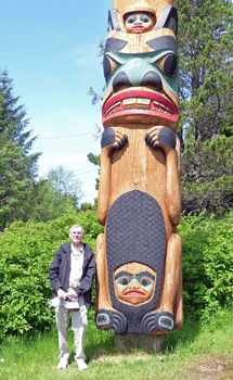 Walter Cooke next to totem pole