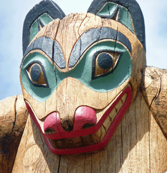 Detail on totem at Saxman totem park Ketchikan AK