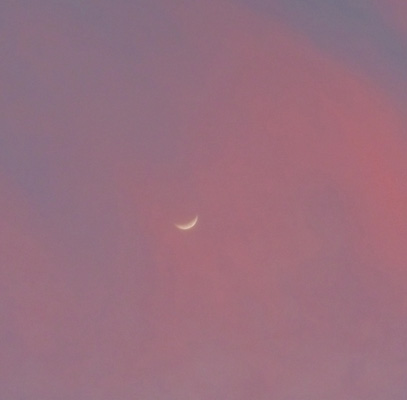 Crescent moon at sunset