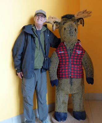 Walter Cooke with large stuffed moose
