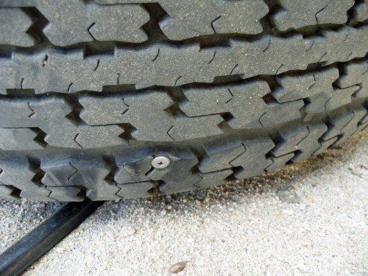 Airstream tire with screw in tread