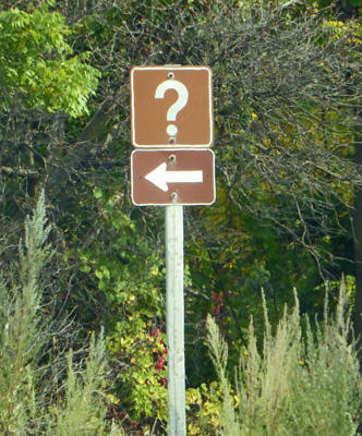 ? and arrow sign