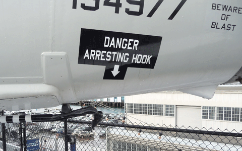 Arresting hook on jet on USS Midway