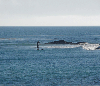 Stand-up paddle boarder Refugio State Beach