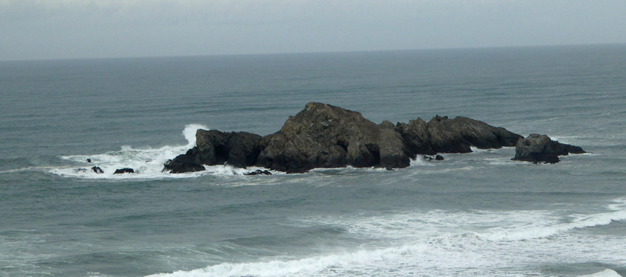 Surf on rocks Cape Blanco