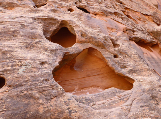 Holes in rock Burr Trail Long Canyon