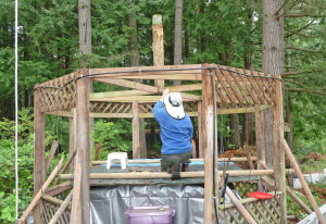 Walter Cooke removing kingpost from gazebo