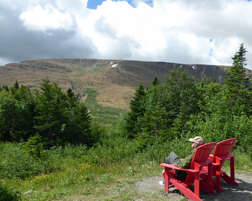 Tablelands red chairs Gros Morne