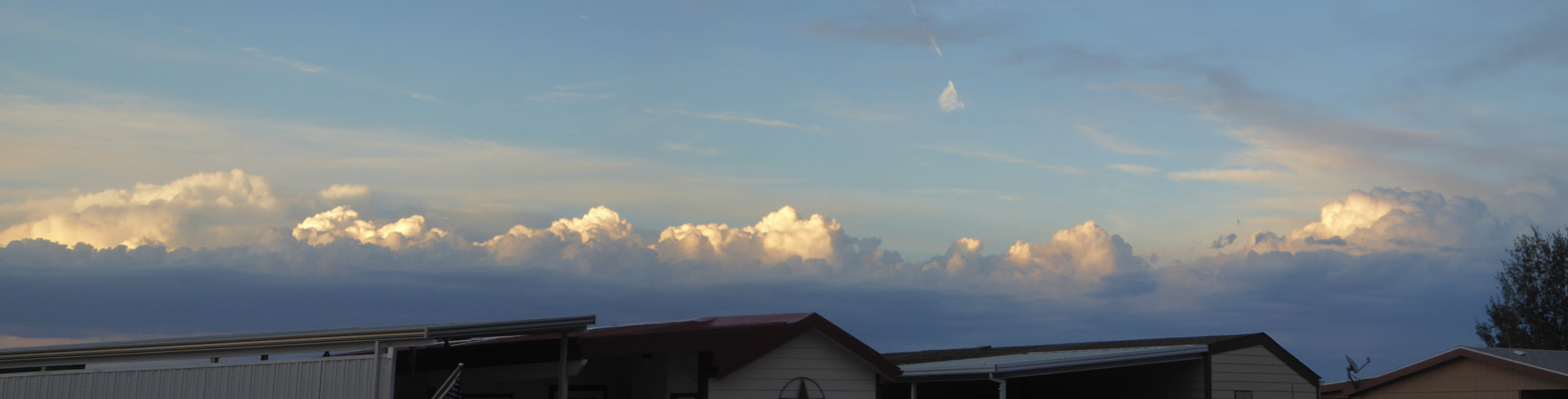 Sun on cumulus clouds