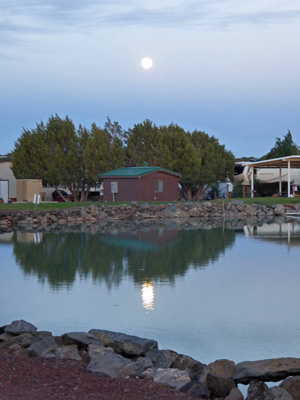 Full moon reflected in lake