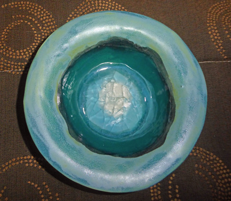 Pottery bowl with glass
