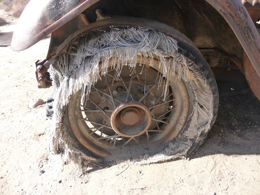 Tires on old truck Wall Street Mill Joshua Tree NP