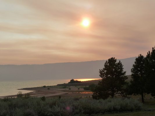 Smokey sky with orange sun Lake Cascade SP