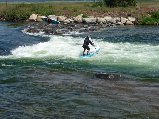 Stand up boarder down rapid Kellys whitewater park ID
