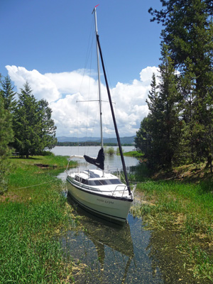 Sailboat moored in creek at Buttercup Campgound ID