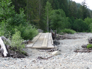 Old washed-out bridge on trail to Monte Cristo WA