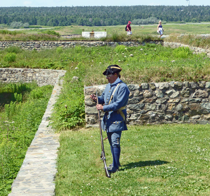 Firing a musket Fortress of Louisbourg
