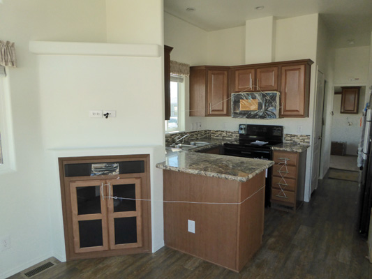 Entertainment Center and kitchen