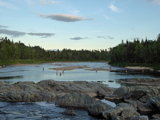 The Indian River is a major salmon fishing river (only fly fishing is allowed) and it turned out that this was the final night of fishing before it was closed for the season. Walter counted 15 fisherman out in the river!