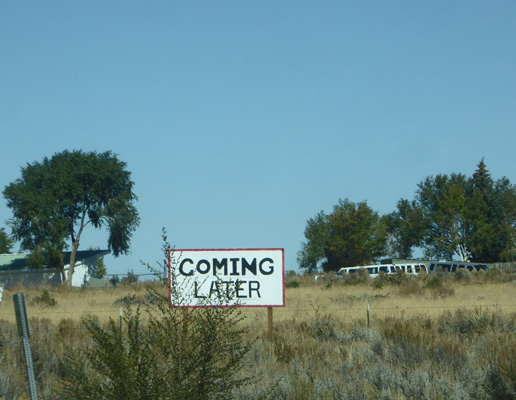Coming Later sign